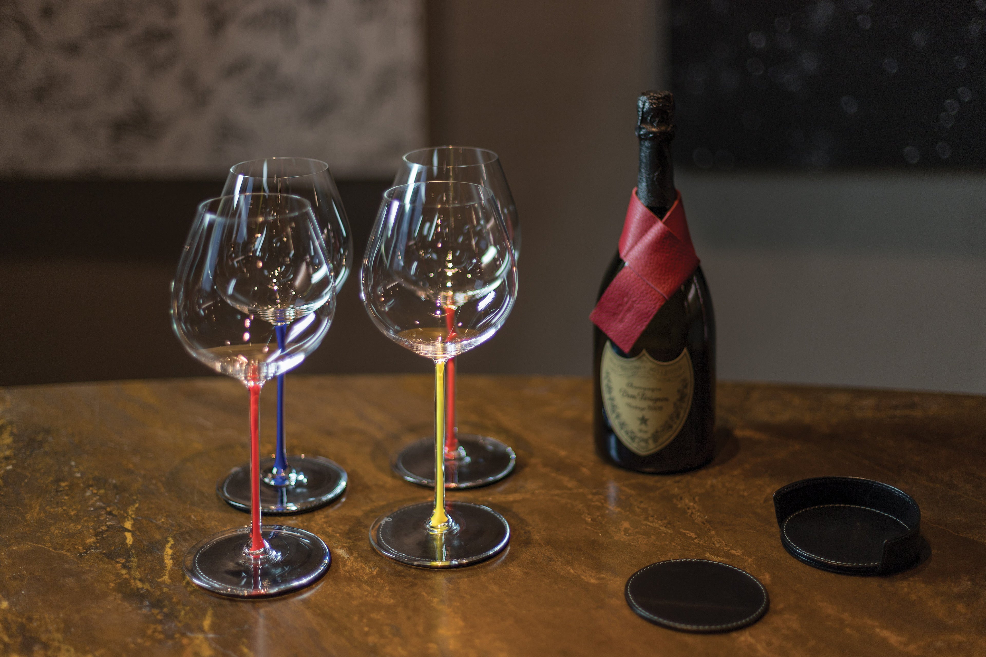 K0010XB | Bottle saver Made in Italy from genuine full grain leather, dollar grain - Bordeaux color. Dimensions: 27 x 4 x 0.5 cm.  Packaging: rigid bottom/cover Gift Box